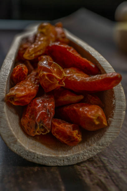 istock whole cayenne in a wooden spoon 1363957784