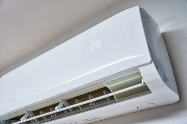 istock Air conditioner hanging on the wall, close up 1363958603