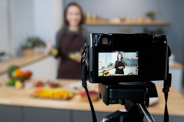 istock Video camera with happy young woman on screen 1363959727