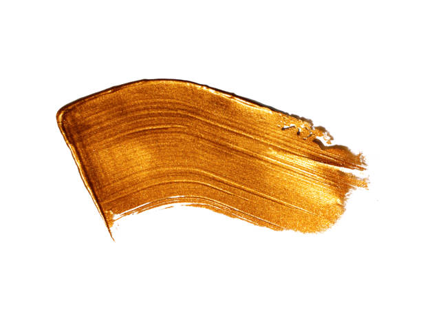 istock Textured golden strokes isolated on white background. 1363959764