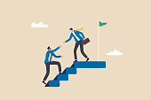 istock Ethical leadership help colleague to succeed and reach goal achieve target, mentorship, support or help for career success concept, businessman leader help employee climb to target at top of stair. 1363960193