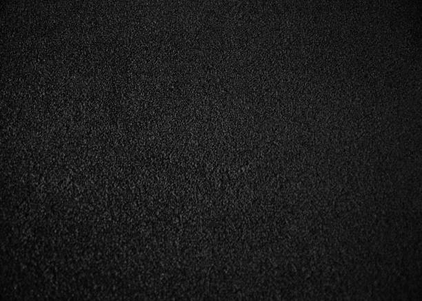 istock Black indoor office carpet texture. High resolution seamless monochrome wool fabric background. Interior material background top view. Short pile carpet. Blank generic microfiber textile texture 1363960498