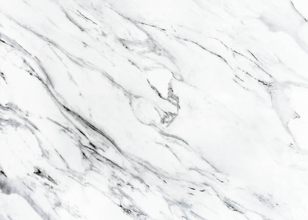 istock White marble texture background pattern top view. Tiles natural stone floor with high resolution. Luxury abstract patterns. Marbling design for banner, wallpaper, packaging design template 1363961266