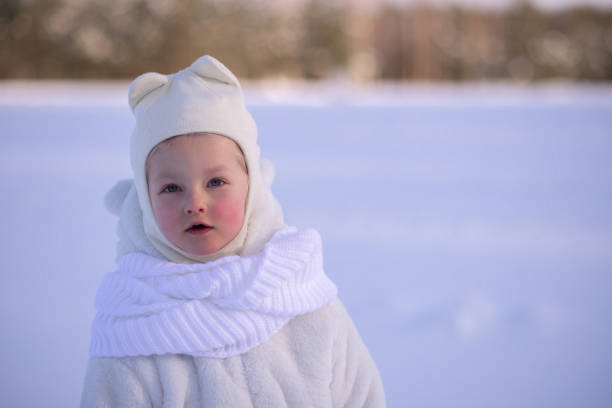 istock A girl in white coat 1363966014