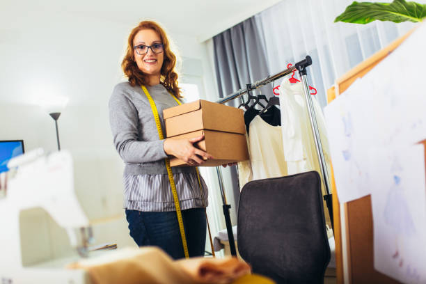 istock Seamstress woman at home accepting new orders 1363967173