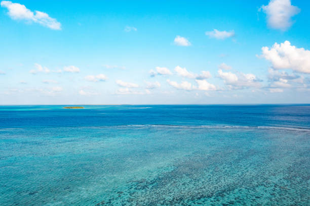 istock Aerial view of ocean and blue sky 1363967385