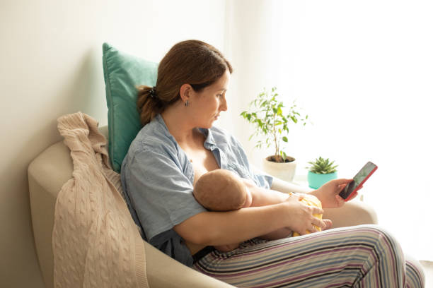 istock Young Woman Using Mobile Phone At Home 1363967621