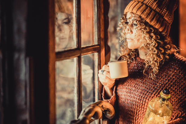 istock Close-Up Of Coffee Cup On Window 1363968002