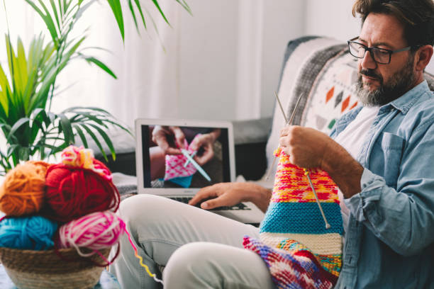 istock Midsection Of Man Using Mobile Phone At Home 1363968119