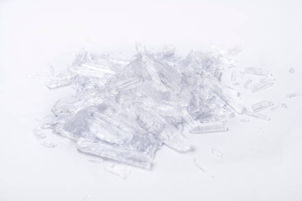 translucent menthol crystals on a white background stock photo