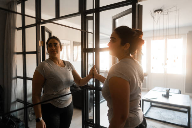istock Standing in front of the mirrored closed door 1363971691