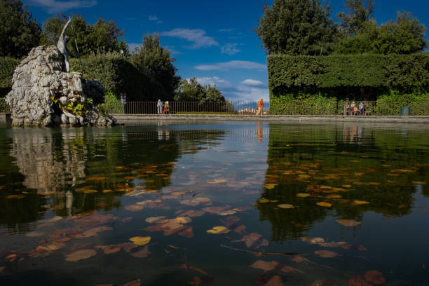Florence, fallen leaves in Neptune pond of Boboli garden