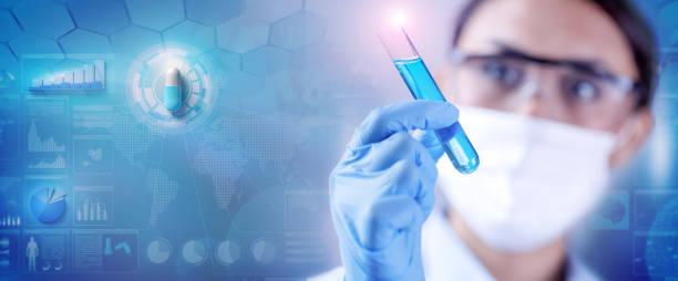 Female chemist working at pharmaceutical research stock photo