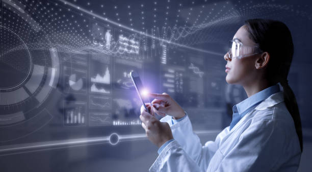 istock Female scientist analysing data on HUD 1363977425