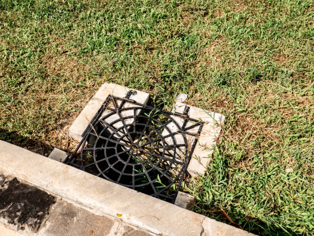 istock sewer on the grass field in the town square 1363979164