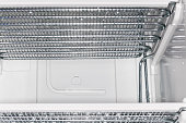 Evaporator of a household refrigerator freezer during unfreezing, selective focus