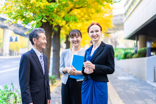 istock A man and woman walking outside with an interpreter 1363979644