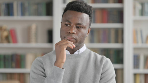 istock Portrait of Pensive African Man Thinking 1363982805