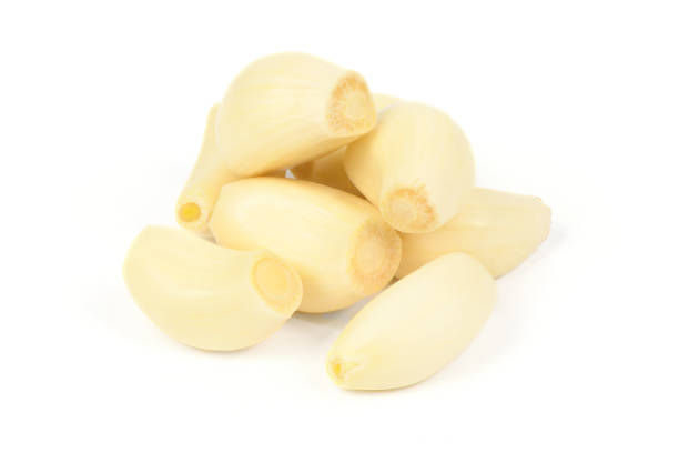 istock Garlic isolated on white background. High resolution photo. 1363983856