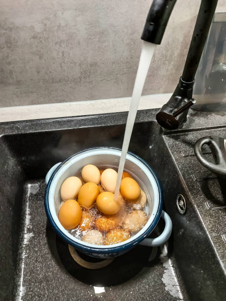 istock Freshly boiled eggs are quenched with cold water 1363983901