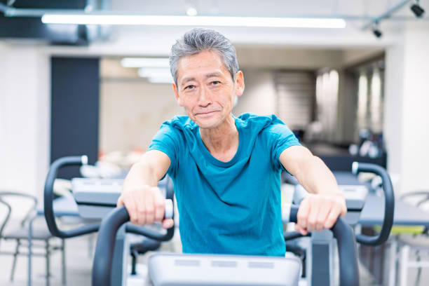istock Old man working out at the gym 1363985334