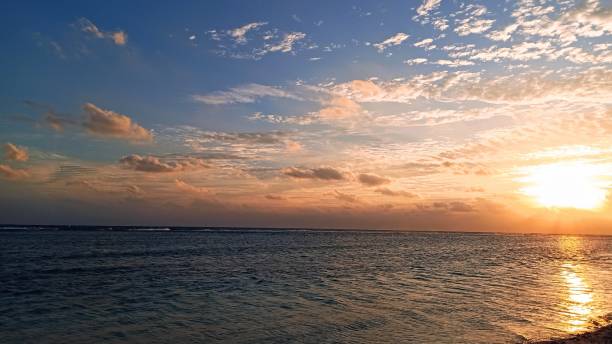 istock Sunrise over the sea horizon. 1363985837