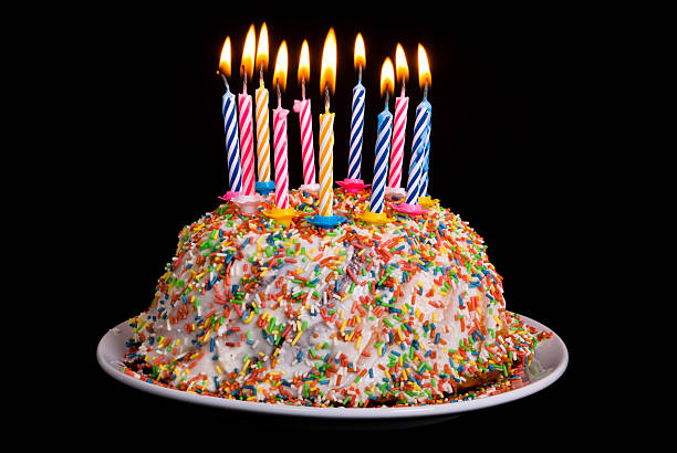 Birthday cake with candles stock photo