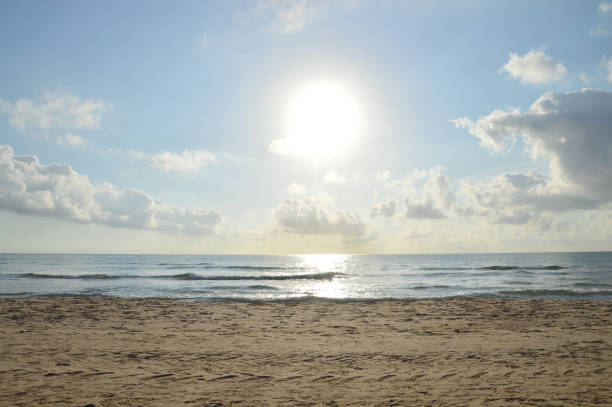 istock Early morning sun rising gleaming on Mediterranean Sea 1363987021