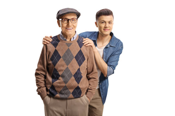 istock Grandson standing behind his grandfather and smiling 1363987217