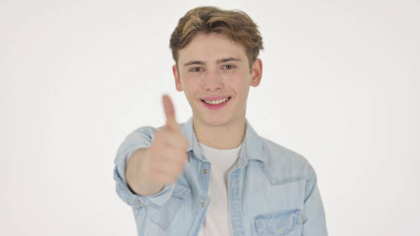 istock Young Man showing Thumbs Up Sign on White Background 1363992623