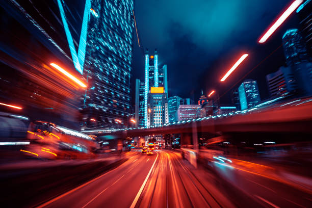 istock blurred Motion Speed Light Tail with Night City Background 1363993218