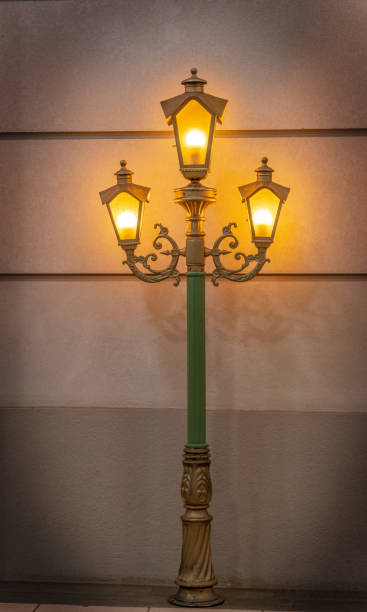 istock Illuminated ornate Victorian streetlamp 1363994283