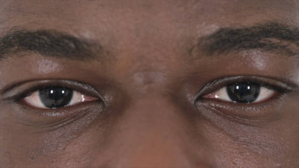 istock Blinking Eyes of African Man 1363994625