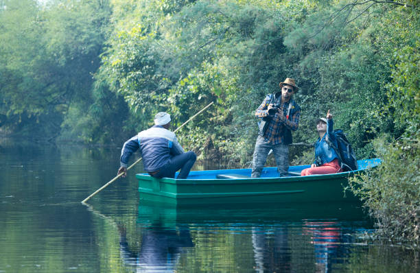 istock Couple admiring view while riding on boat 1363999401