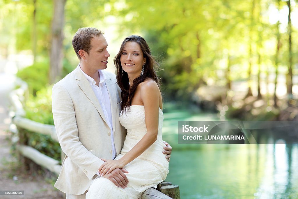 couple of lovers in love on park river hug couple of lovers in love in park river outdoors hug 30-34 Years Stock Photo