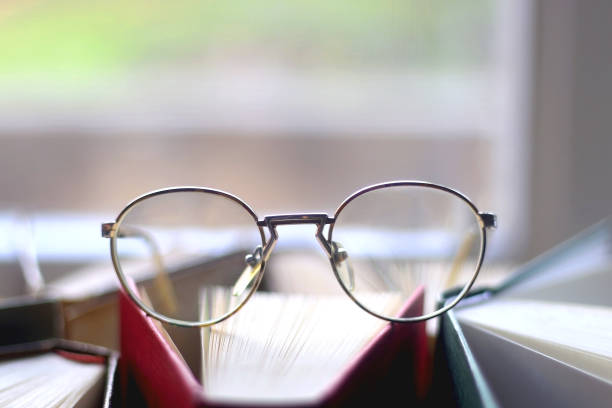 istock Hardcover Books and Reading Glasses 1364007618