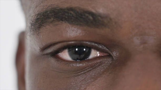 istock One Blinking Eye of African Man 1364009829