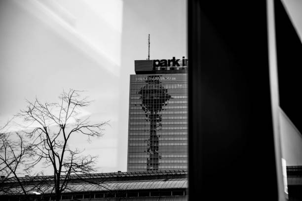 A beautiful view of a TV Tower reflection in a modern building in Berlin, Germany