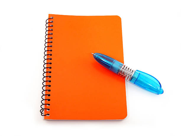Pen and Notebook stock photo