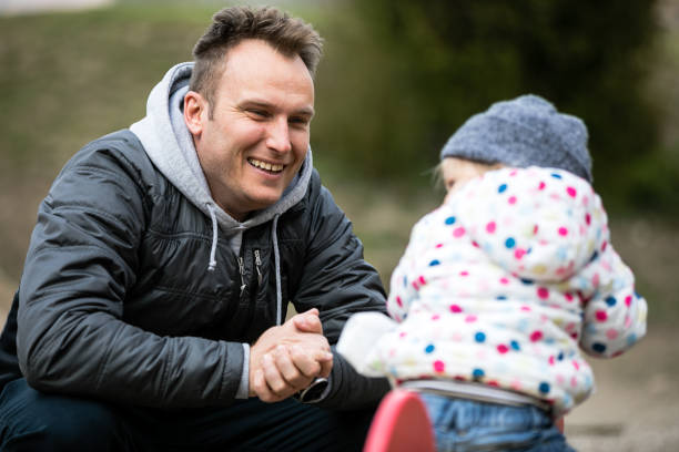 istock Child playing in the park at playground 1364013793
