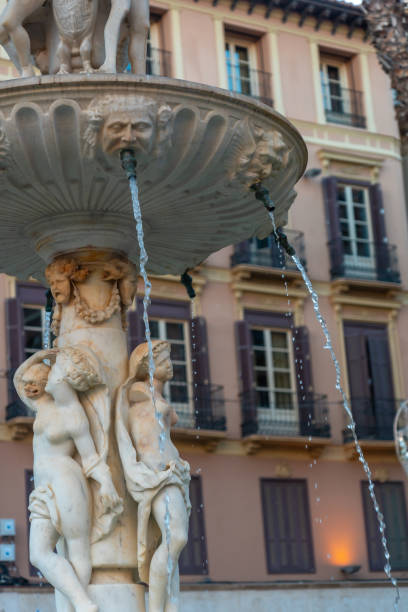 Water fountain in the Plaza de la Constitucion in the city of Malaga, Andalusia. Spain stock photo