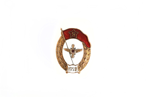 Badge of the military school of the Red Army Air Force 1952 on white background