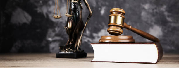 istock judge on book with justice lady 1364020344