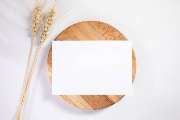istock wheat spike with paper card 1364020374