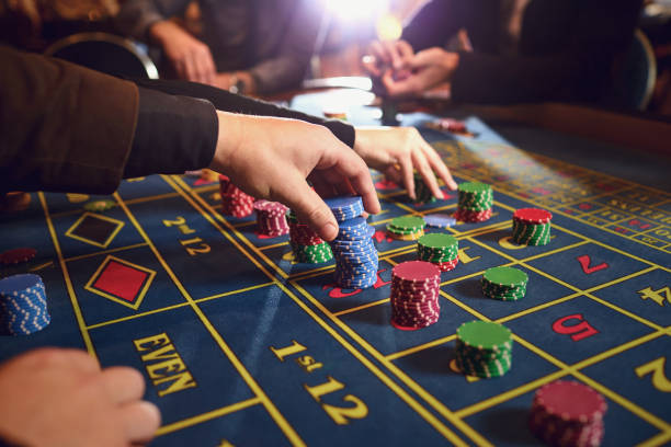 istock Roulette table chips in a casino. Gamblers make bets in a casino. 1364021418