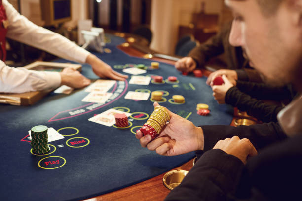 istock Player gamble poker roulette in a casino 1364021429