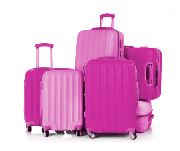istock Pink luggage on white background 1364021674
