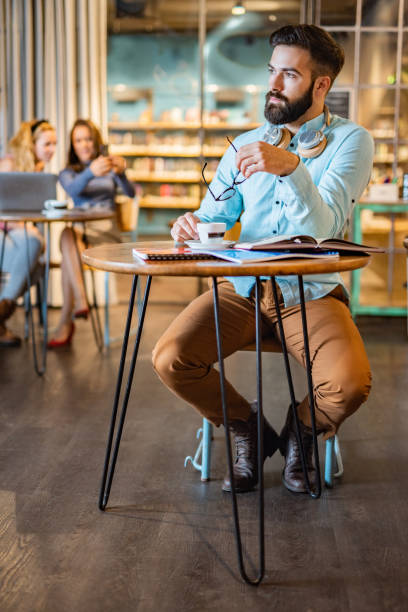 istock Young businessmen have a coffee break 1364023634