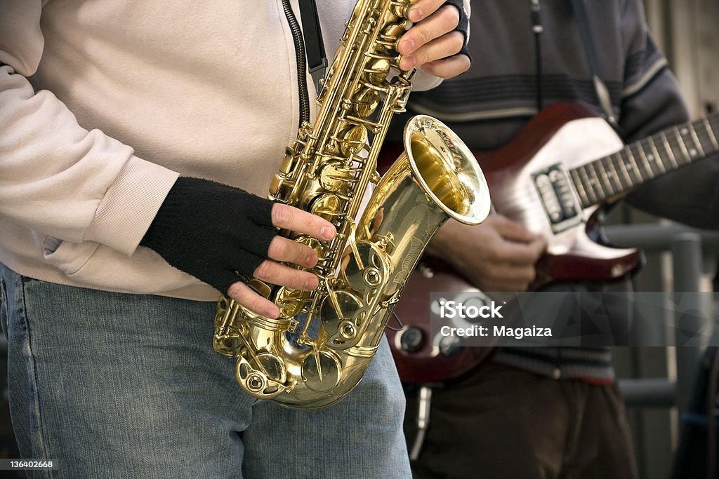 Jazz Band Jazz Band in the street. Saxophonist Stock Photo