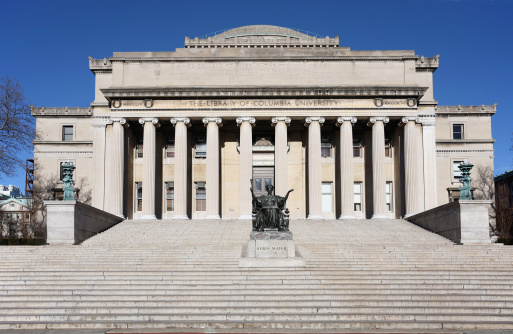 An impressive classical building, at the alma mater of President Obama.  The name of the statue is Alma Mater (nurturing mother), created in 1903 by noted artist Daniel Chester French.  